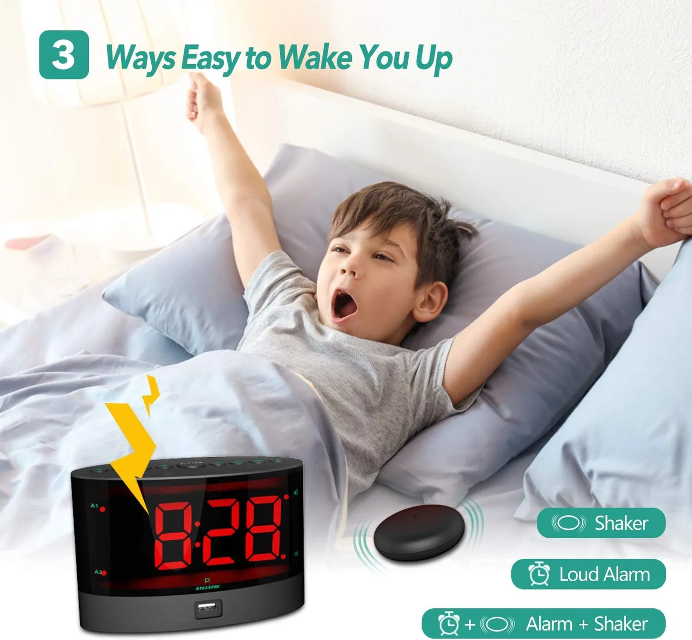 The older red model in a child's room: a wide display, two alarms and the shaker under the pillow.